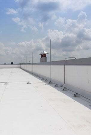 White PVC roofing membrane on flat industrial roof