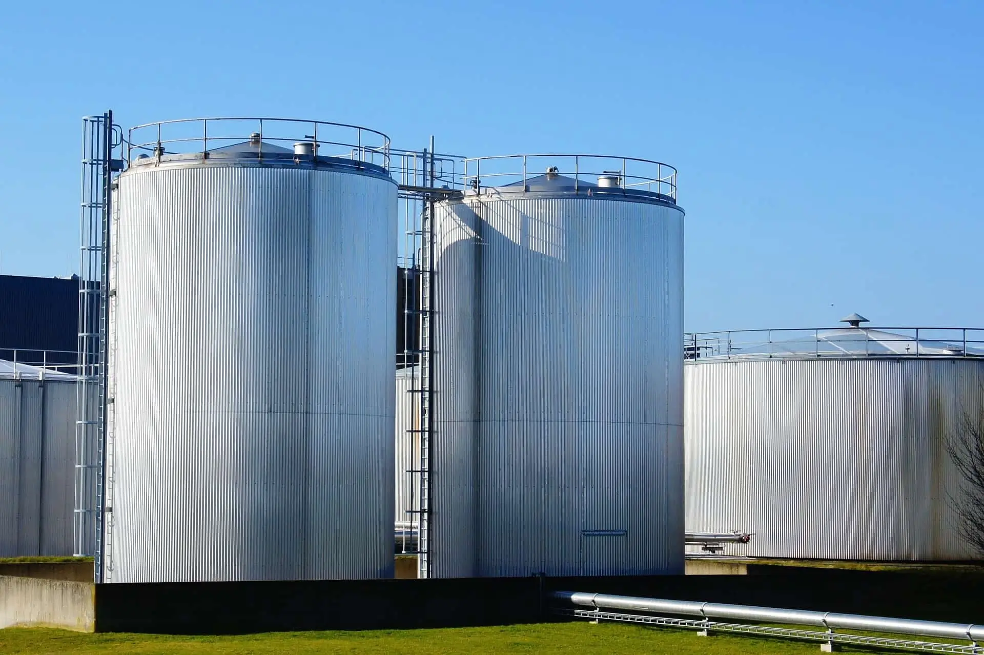 Industrial chemical resistant sealant and adhesive systems